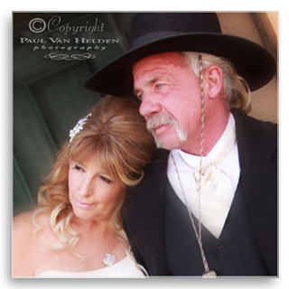 Cheryl and Kelley strike a pose, on their wedding day, at Tombstone Monument Ranch.