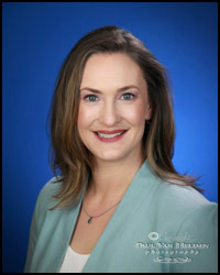 Headshot with Deep Blue Background