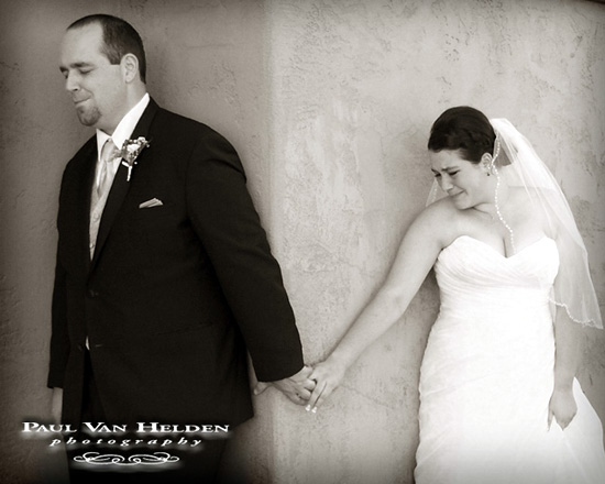 Tara and Brian touch hands, about an hour before heading to the alter, at Hacienda Del Lago in Vail, Arizona.