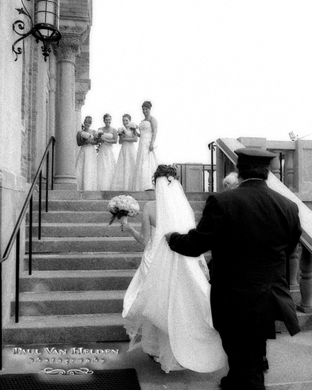 Kari walking up the stairs of Sacred Heart Parish.